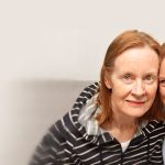 Jenny and Jean sitting on couch