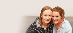 Jenny and Jean sitting on couch