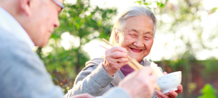 Husband and wife sharing dinner